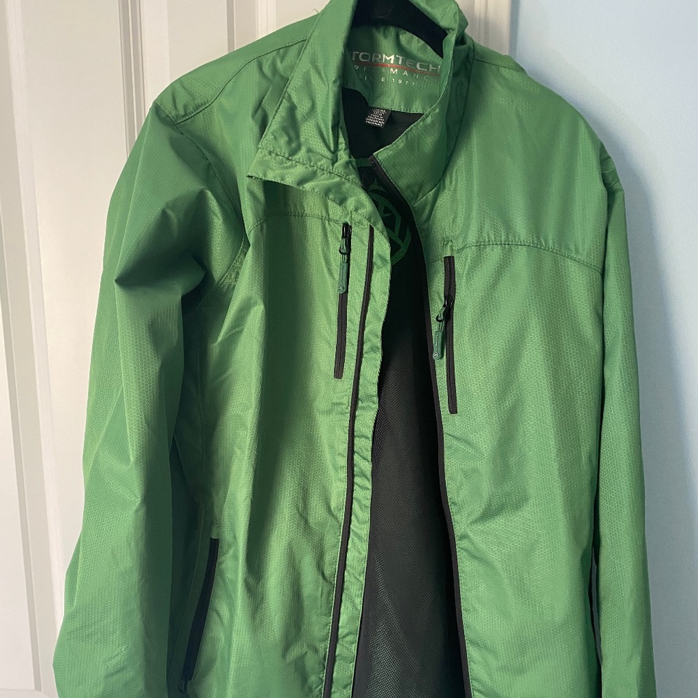 Stormtech green men’s rain jacket size M